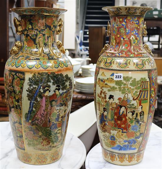 A pair of Japanese style vases on stands